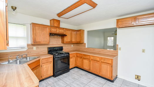 Humble 1-story, 3-bed 1111 Rebecca Lane-idx