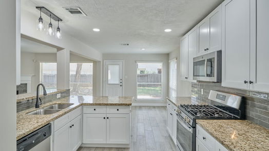 Humble 2-story, 4-bed 18502 Wolf Creek Trail-idx